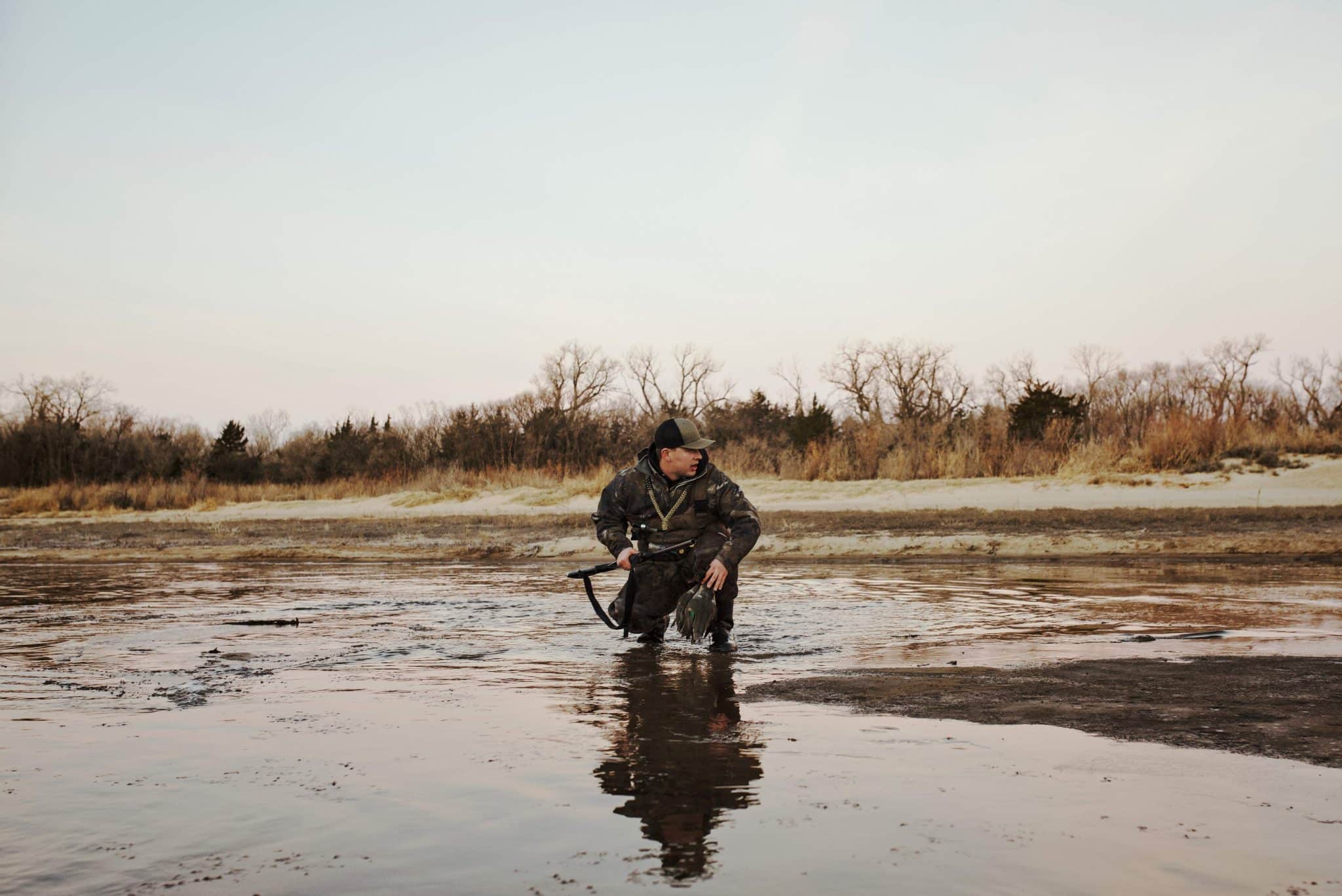 SQUATTING WITH DUCKS